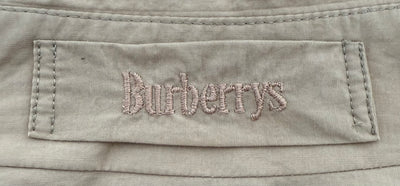 Gabardina Burberry (L)