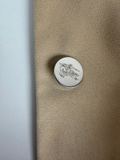 Gabardina Burberry (L)